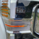 Image for article titled The 2021 Ford F-250 Lariat Tremor With A Ramp Kit Makes A Pretty Great Way To Haul A Changli Across The Country